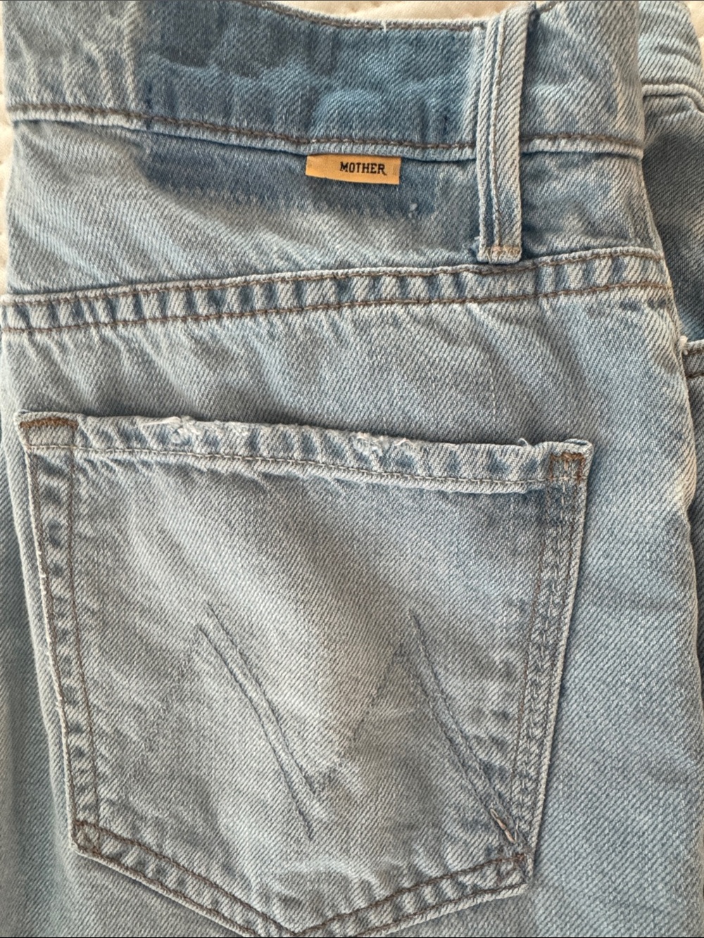 MOTHER Light Wash Boyfriend Jeans in Pale Blue